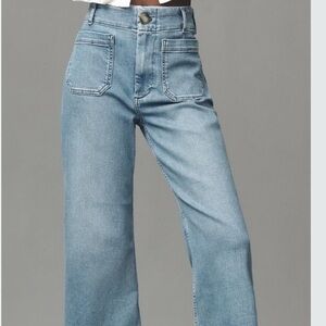 Maeve Light Blue Flare Jeans by Anthropologie